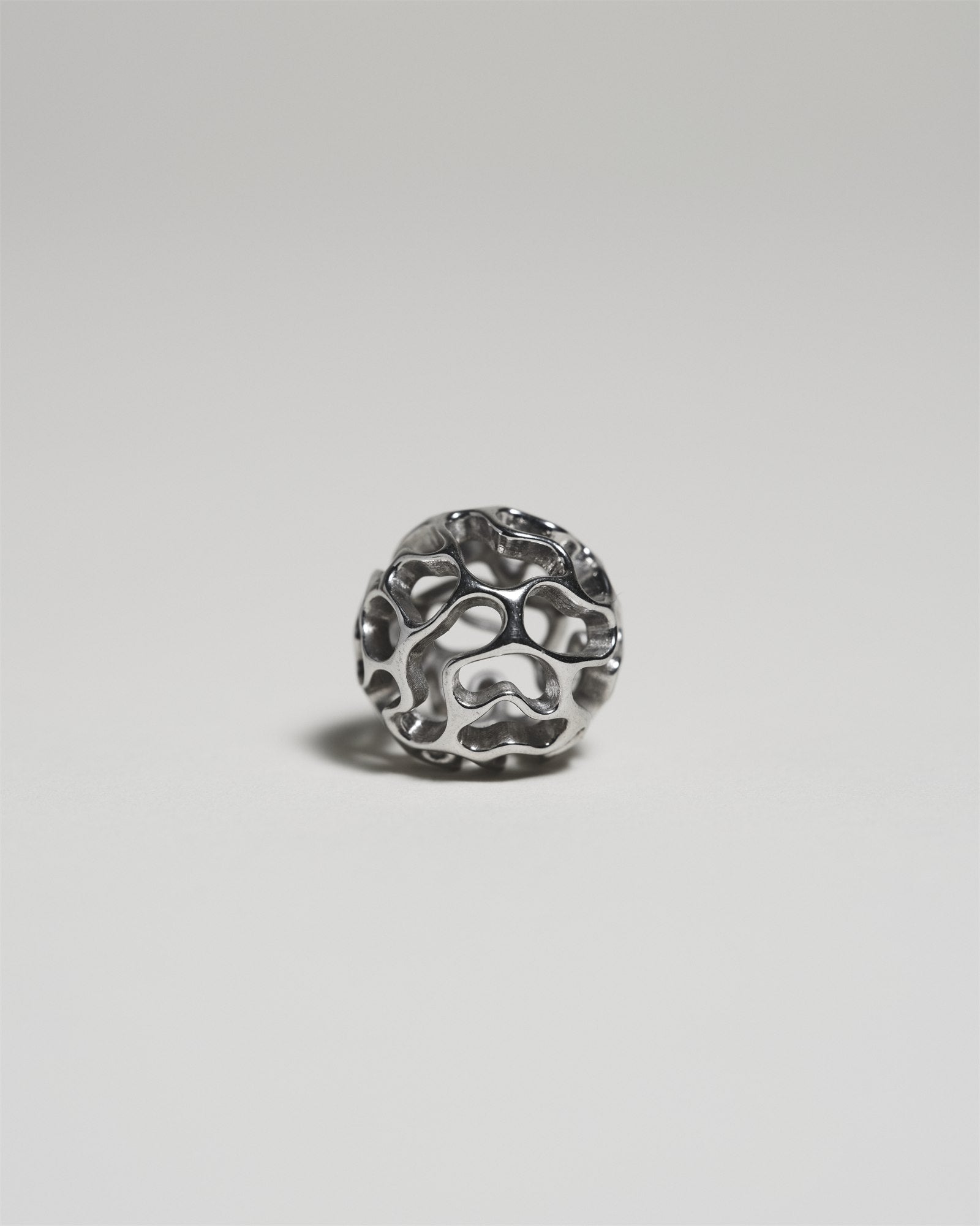 AION sculptural silver jewelry with an open organic surface